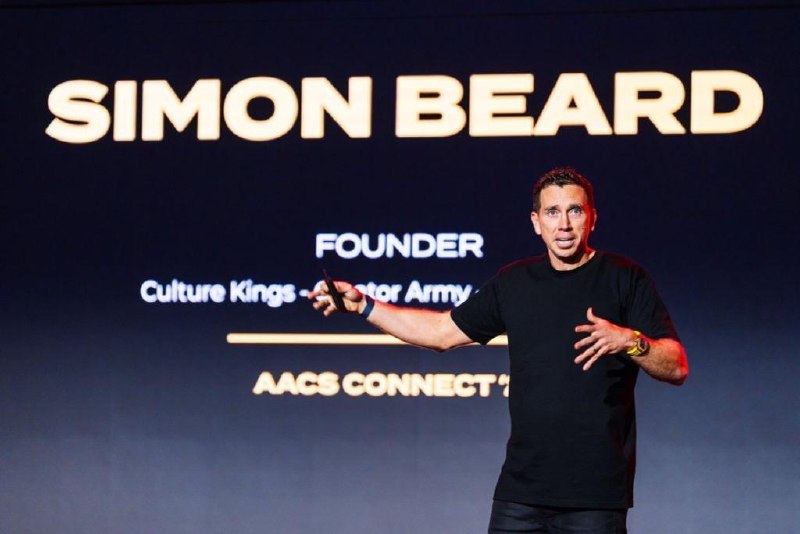 Simon Beard speaking on stage